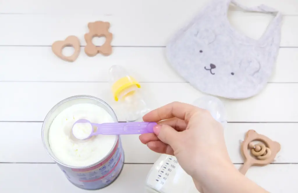 Carefully making up baby formula